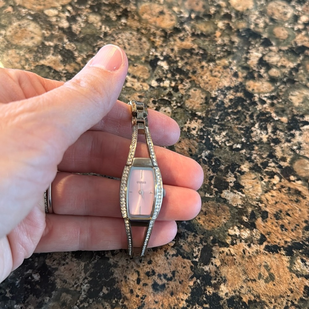 Guess watch with pink background - studs around edge